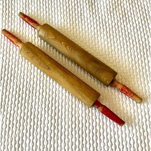 Two vintage rolling pins, wooden, red handles